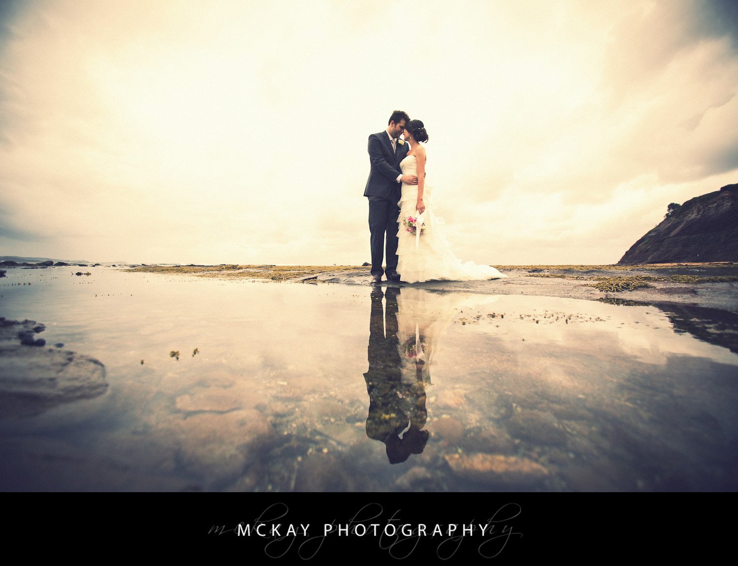 Awesome reflections at Long Reef Sam Thibault Wedding 