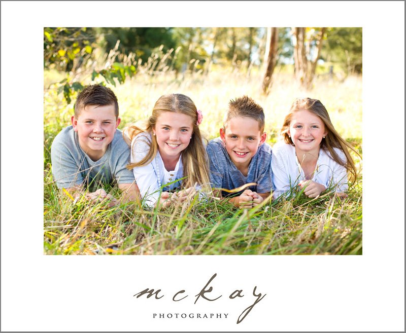 kids family photo in long grass