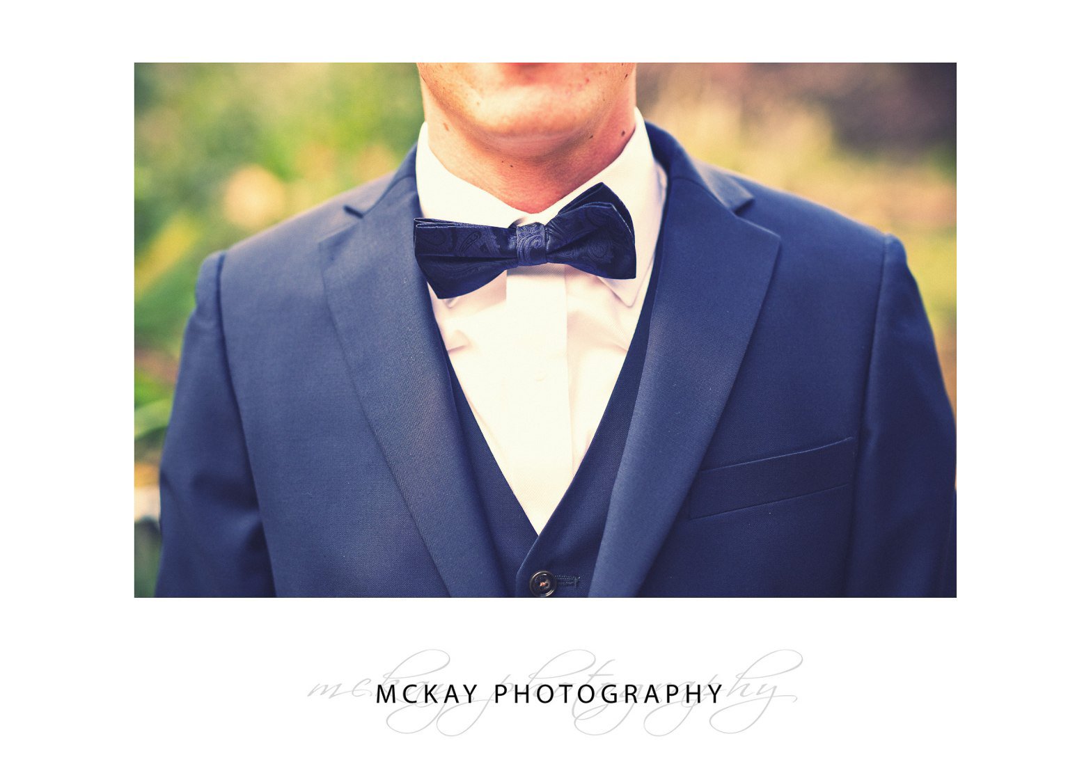 Bow tie groom suit detail