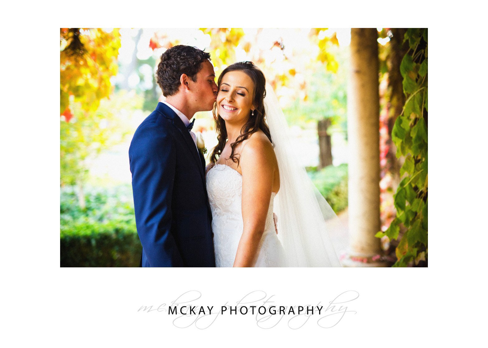 Bride and groom autumn leaves Bowral