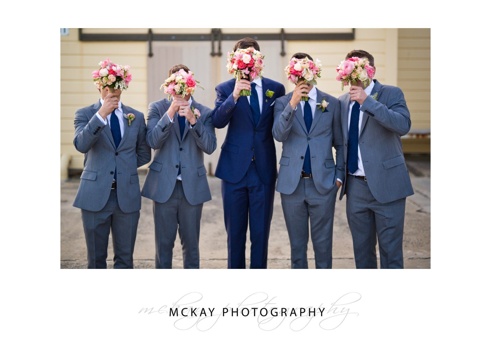 Groomsmen and flowers