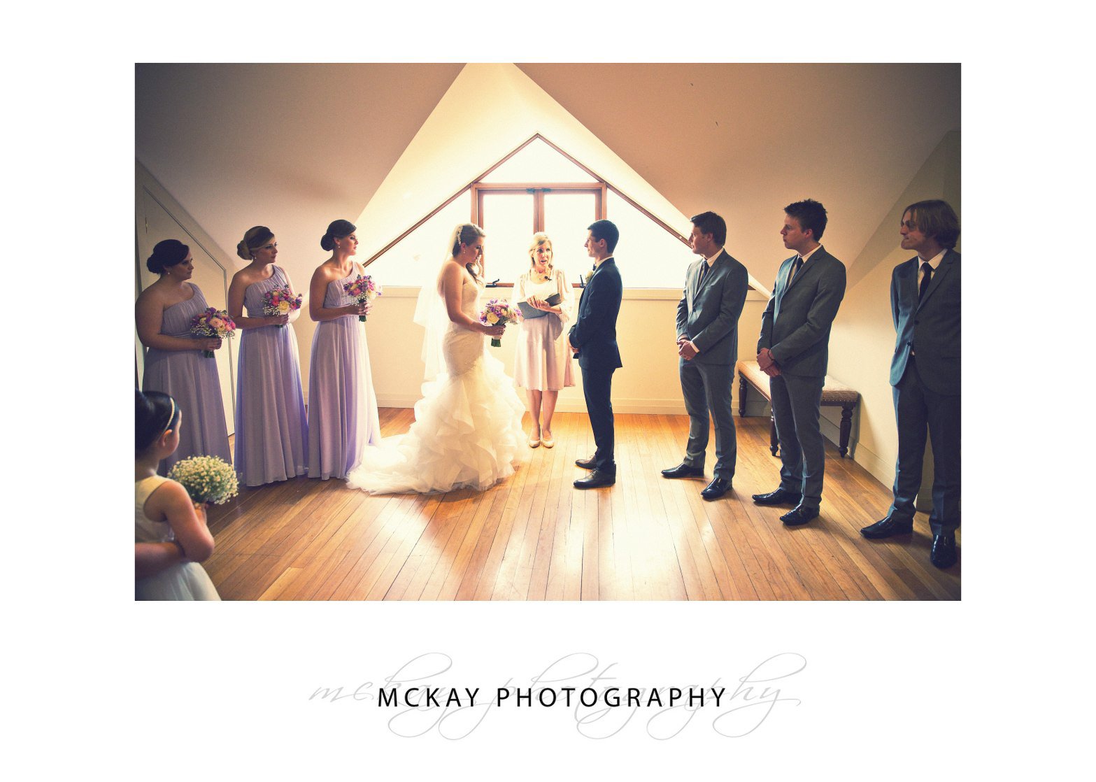 Wedding ceremony in the gallery upstairs at Centennial Vineyards