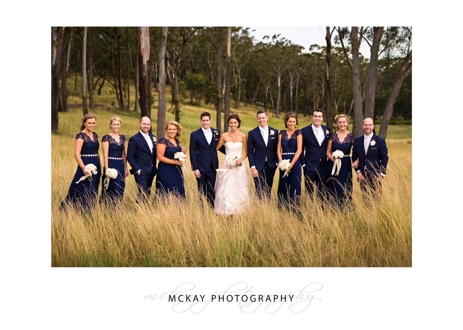 Bridal party in long grass