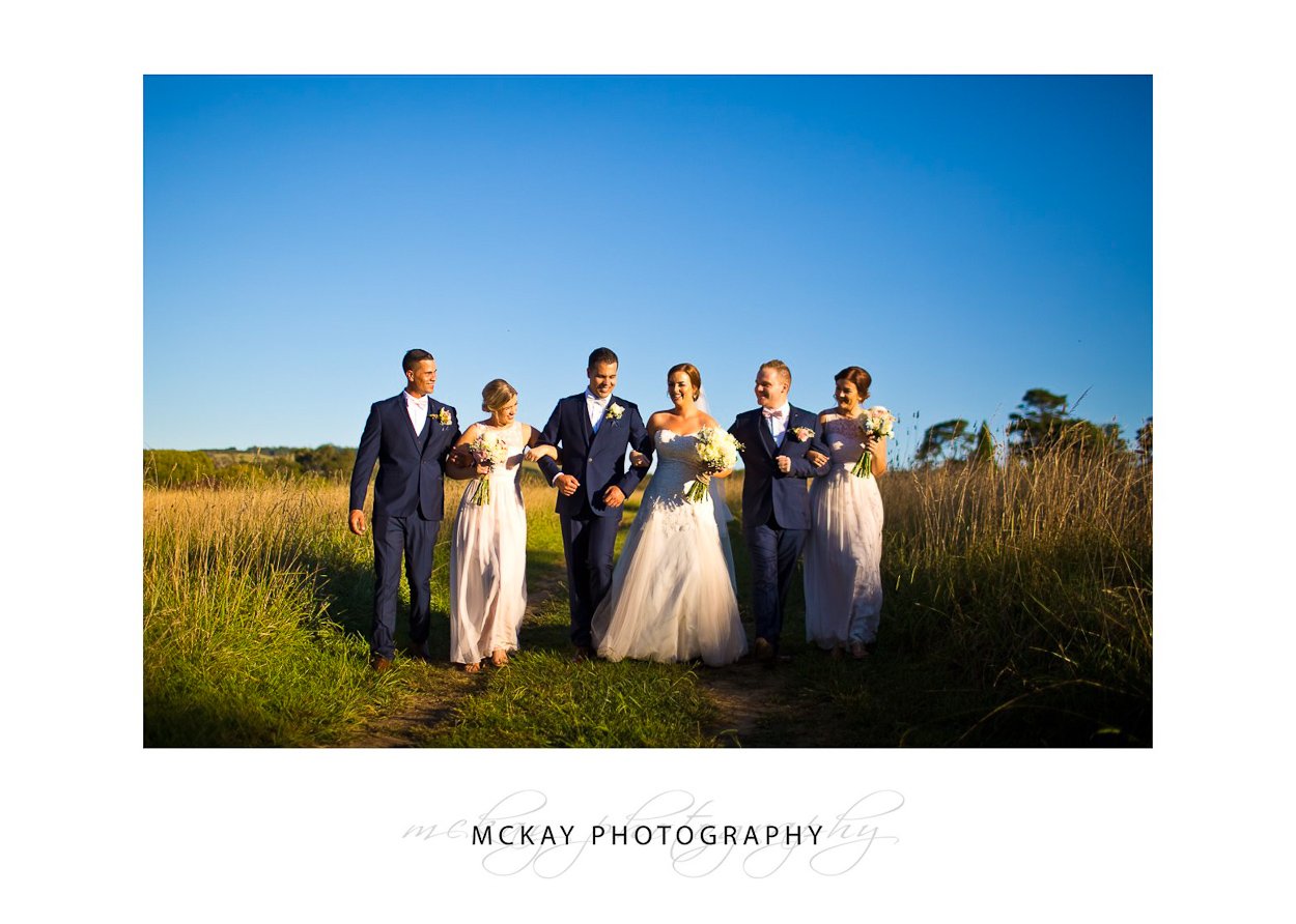 Bridal party in the field at Night shot at Bendooley Estate