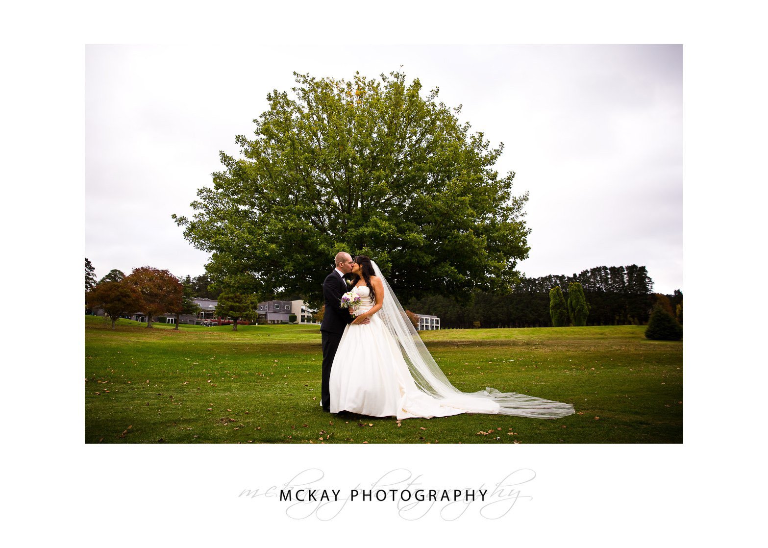 Photo on golf course with tree at Gibraltar Hotel Bowral wedding