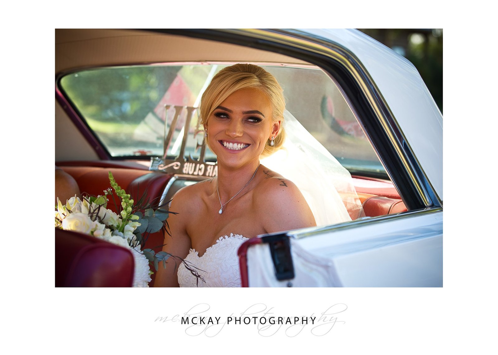 Ashlee arrives in a Chev Impala wedding car