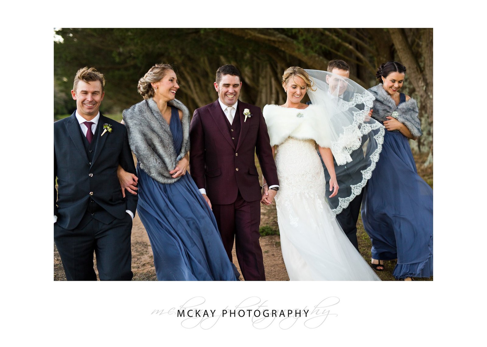 Bridal party braving the cold winter wind