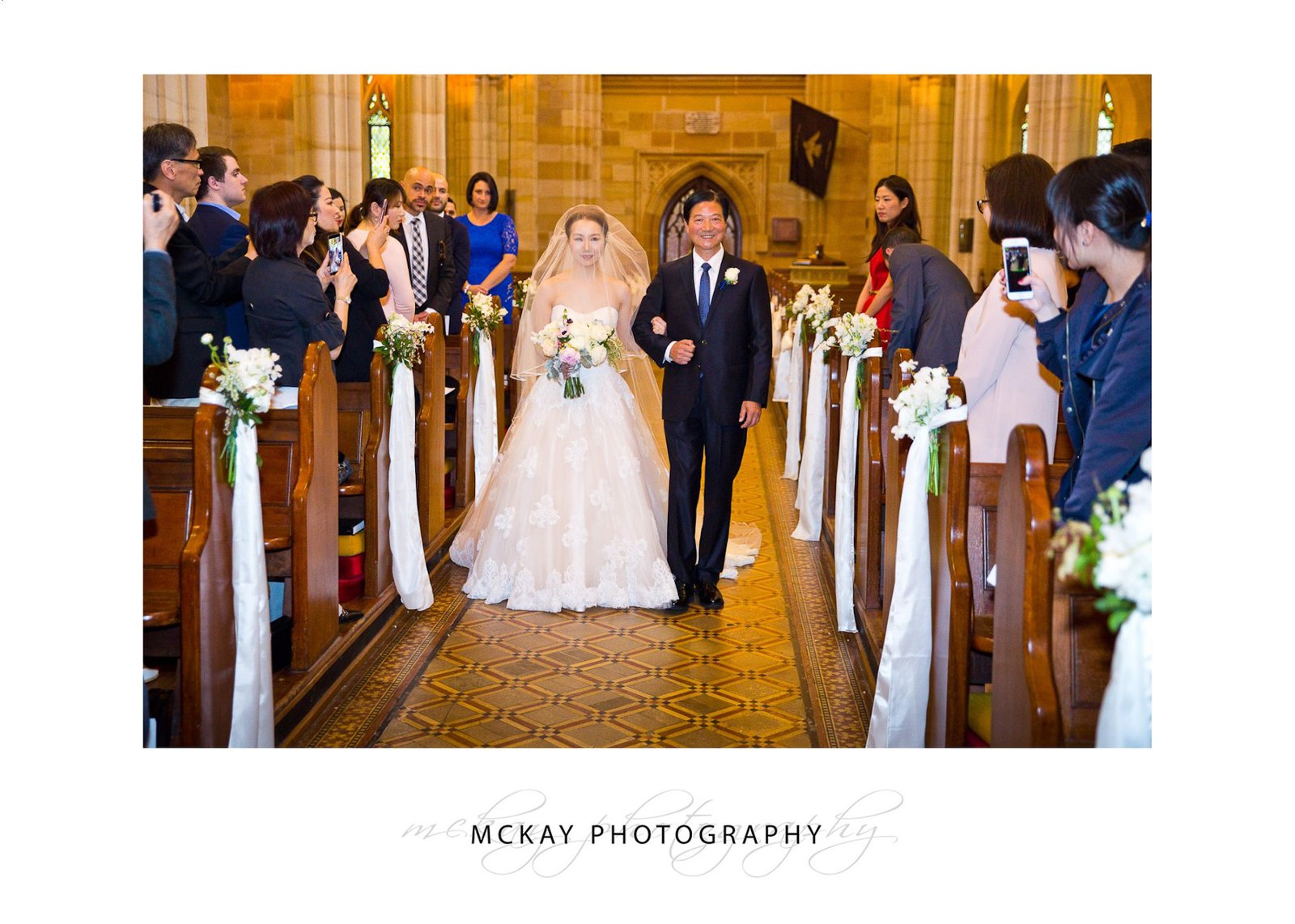 Bride walks down aisle at St Philips Church