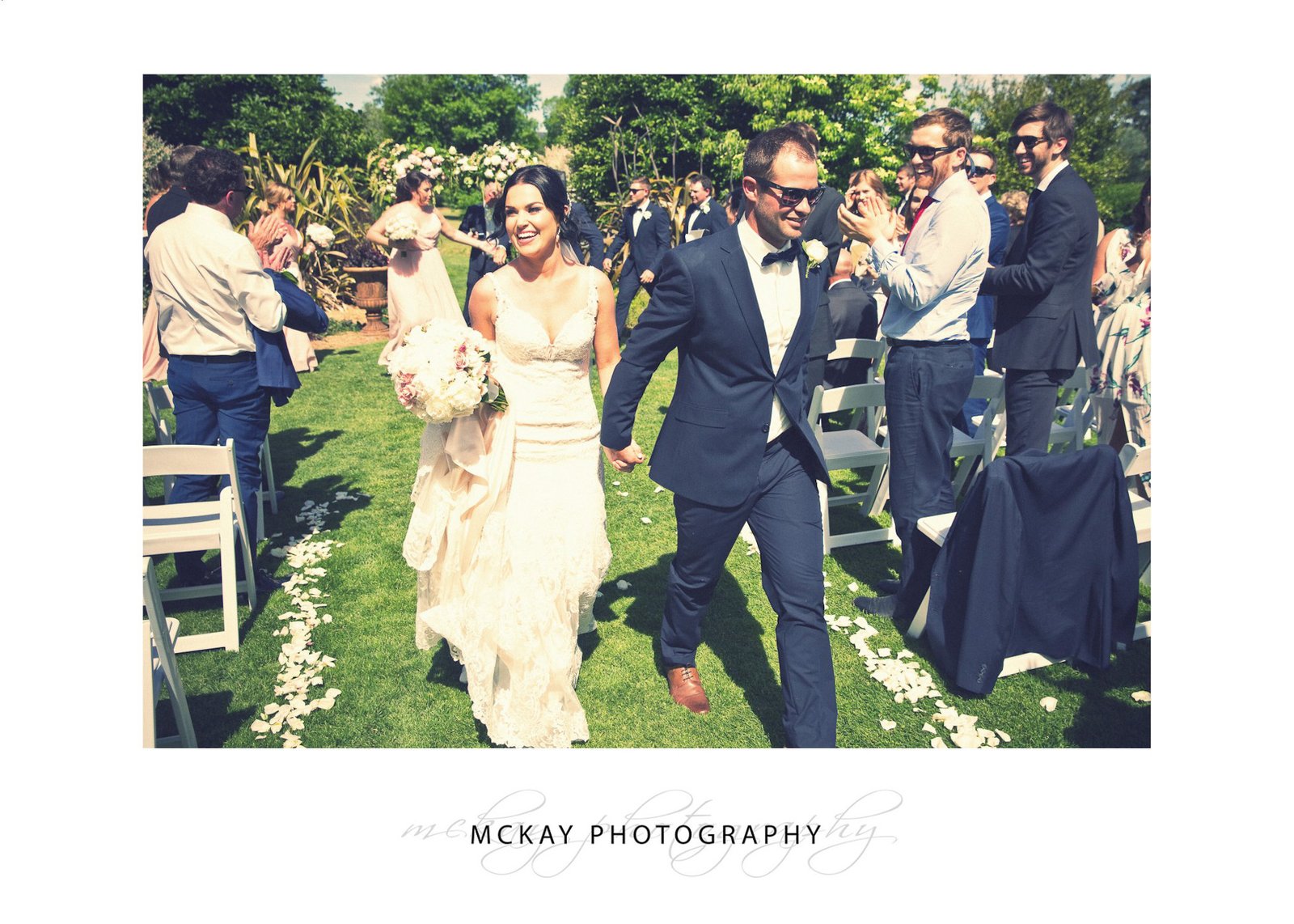 Wedding ceremony on lawn garden at Peppers Craigieburn