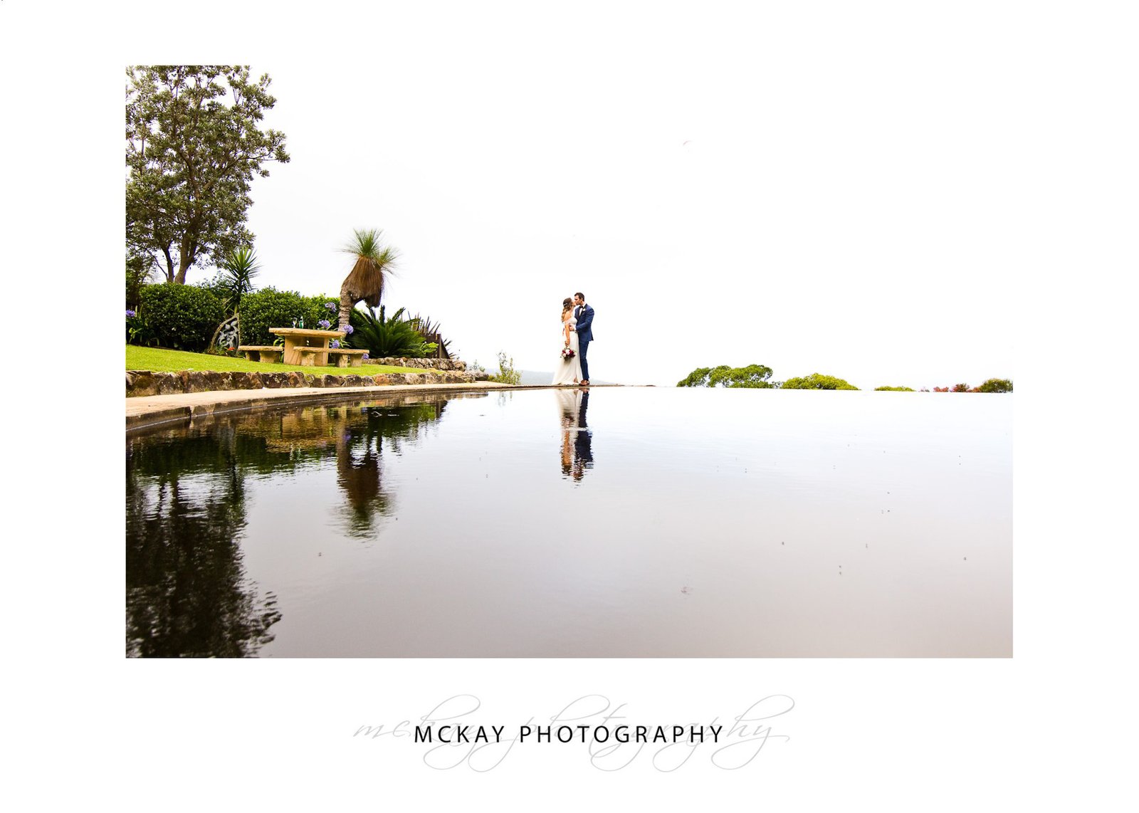 Tumbling Waters Retreat wedding photo pool reflection