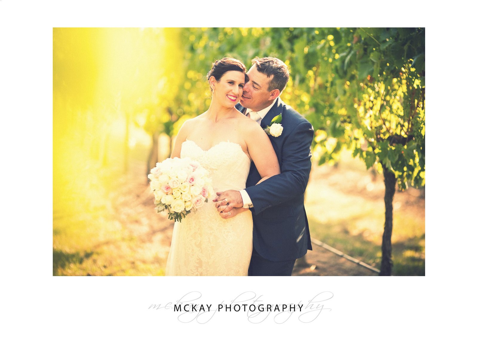 Romantic photo in the vine rows wedding Bowral