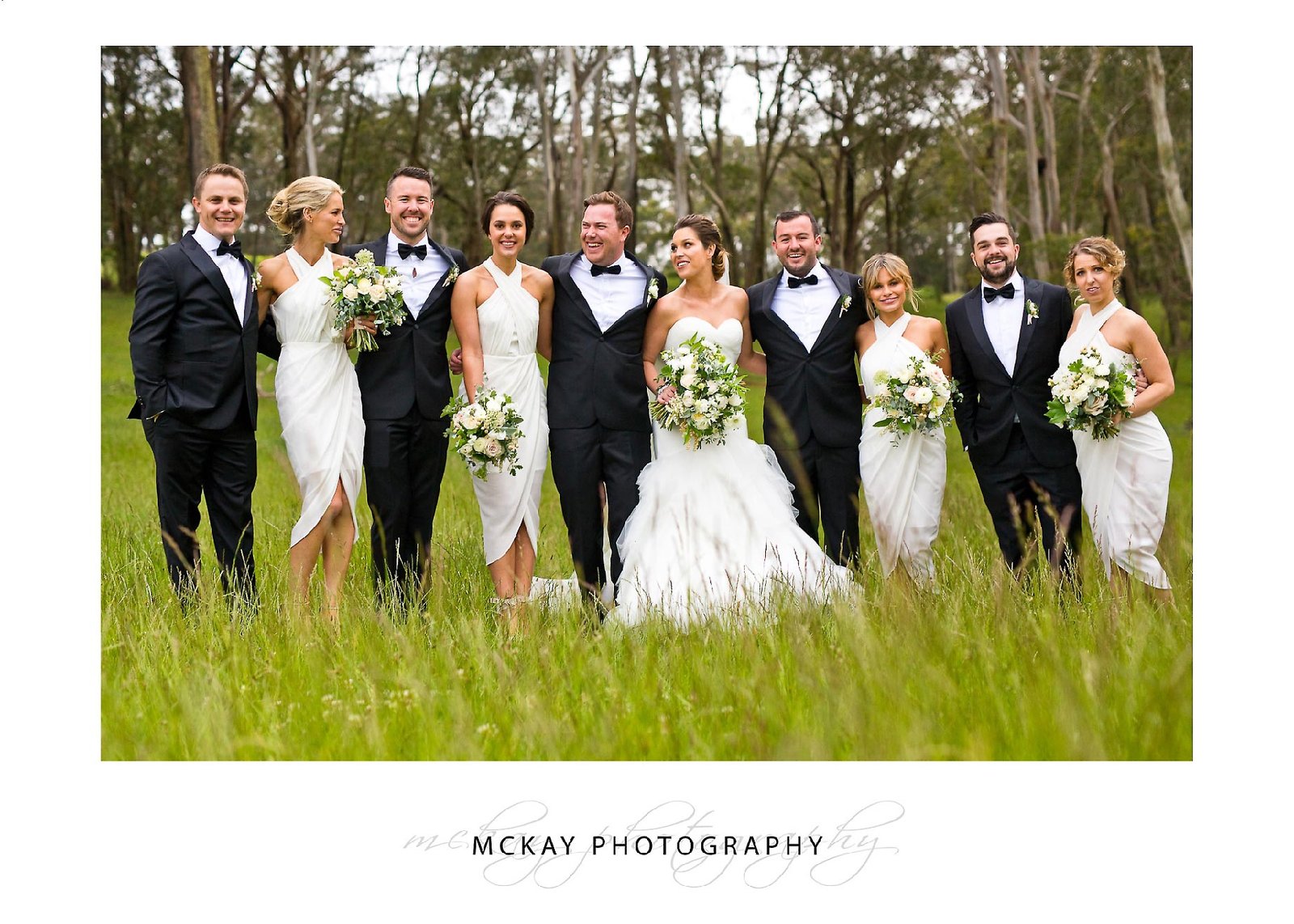 Bridal party in long grass photo Bowral