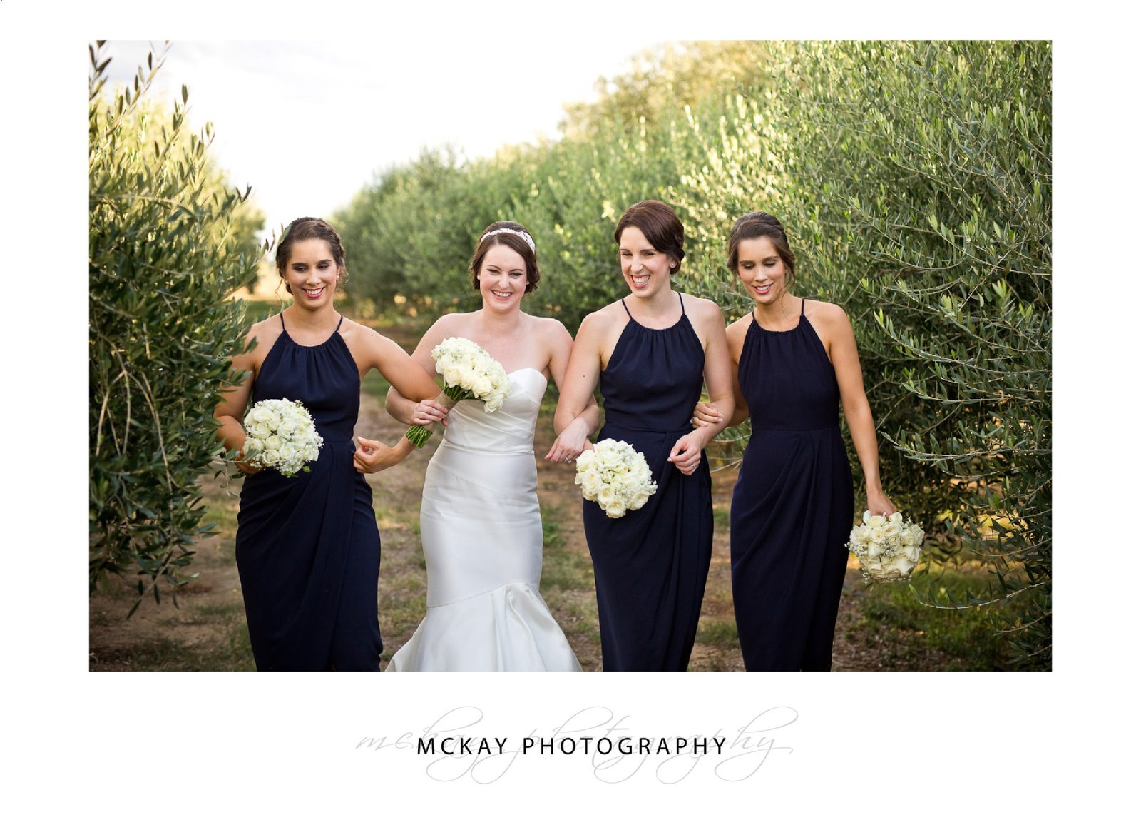 The bridesmaid amongst the olive grove