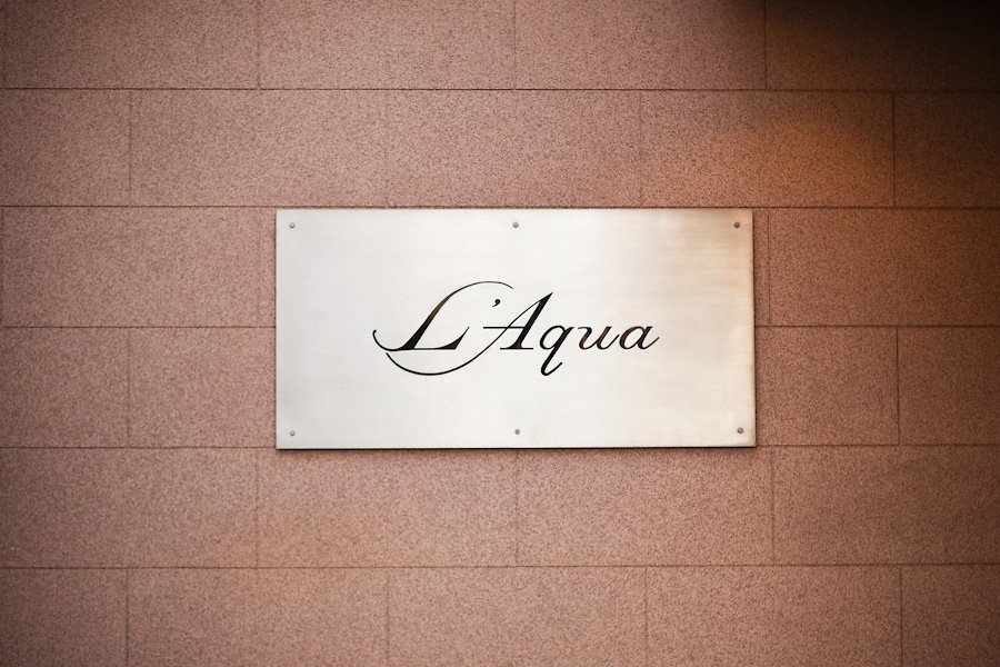 L'Aqua sign logo