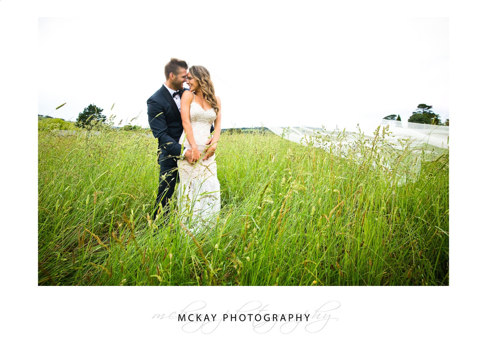 bride groom grass field photo