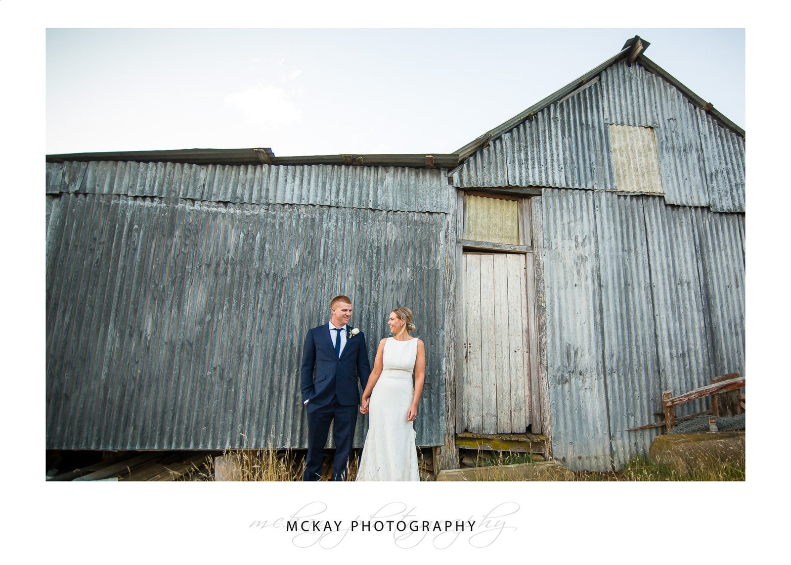 Mel & Scott hanging out at the old sheds farm wedding
